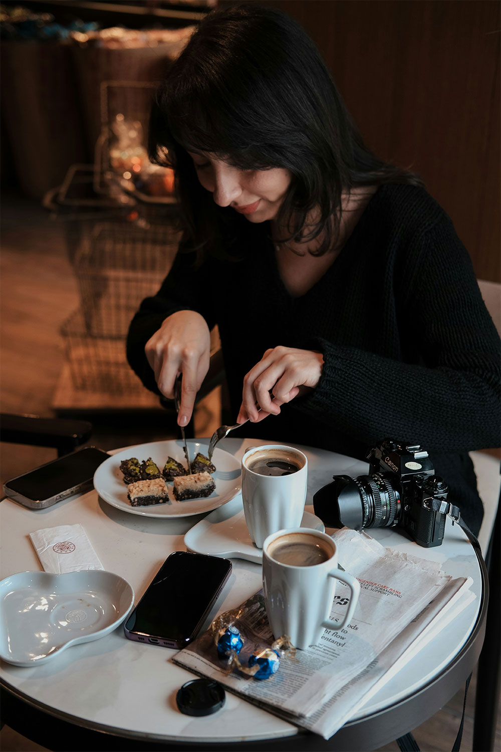 Solo female traveler in Italy eating pastries on single travel to Italy